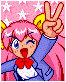 Pixel art character with pink hair and yellow ears making a peace sign against a pink starry background.