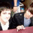 Pixelated image of people at a table with purple text reading 'I Love Panic! At The Disco' on dark and light backgrounds.