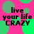 A static image with a bright pink background featuring scattered green circles and repeated text "live your life CRAZY" in black pixelated font.