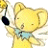 A 48x48 pixel animated buddy icon featuring a yellow cartoon koala with white wings and a blue star-shaped collar, holding a black-and-white object resembling a camera or microphone against a black background with stylized text.