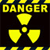 Yellow 'DANGER' text above a radiation symbol on a black background with yellow border elements.