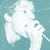Pixelated teal background with white silhouettes of two people singing into microphones and bold text reading TAKING BACK SUNDAY.