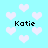 Light blue background with scattered white pixelated hearts and four instances of the text 'Katie' in black pixelated font.