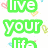 Pixelated text reads 'live your life' in green and 'CRAZY every minute' in purple and orange with small heart symbols scattered on a white background.