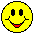 Two yellow pixelated smiley faces with black outlines, red mouths, and one face missing an eye.