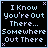 A 4x3 contact sheet of 12 animated frames showing a pixelated text-based animation with light blue text on black background, each frame displaying the phrase "I Know You're Out There... Somewhere Out There" in varying states of partial visibility and dithering effects.
