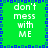 Green background with blue pixelated border, white text 'don't mess with ME' repeated in four quadrants.