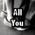 Four- of pixelated images with text overlays: top-left shows a metallic object with 'All You', top-right a heart drawn in sand with 'Need', bottom-left colorful hearts with 'Is', bottom-right piano keys with 'LOVE' text