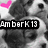 Pixelated grayscale image of a dog with a pink heart shape in the top-left corner and a black banner with white text reading 'AmberK13' across the middle.