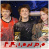 Group of four people holding a trophy with 'F.R.I.E.N.D.S' text below, displayed in a