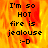 Pixelated text on a fiery background with 'I'm so HOT fire is jealous :-D' displayed in four , one grayed out
