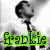 A pixelated grayscale image of a person with short dark hair holding a microphone, overlaid with bright green text reading 'frankie' in bold lowercase letters.