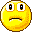 Pixelated yellow circular faces with varied expressions and mouth shapes on a gray background.