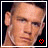 A pixelated close-up of a person's face with short hair, showing two states: one with a red heart symbol and another with a white heart outline.