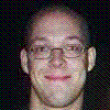 nine shows a person with glasses and a bald head in various expressions against a black background, with one grayed out