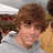 Pixelated image of a person with brown hair wearing gray shirt, next to red text reading 'Ryon Sheckler is a hottie!' on white background.