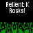 Pixelated text "Relient K Rocks!" appears twice on a black background above green pixelated shapes resembling grass or foliage.