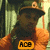 Two side-by-side pixelated images of a person in a cap, one with orange clothing and 'ACE' text, the other with dark clothing and 'Papiel' text.