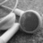 Black-and-white image of a cup with headphones on a textured surface, text changes from 'Music ...' to 'the way of life...' across frames.