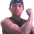 A person wearing a dark sleeveless shirt and blue cap makes three distinct hand gestures against a gray background.
