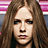 A pixelated image of a person with long brown hair, showing three distinct facial expressions
