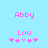 Pixelated text and symbols on a light blue background with pink and purple elements.
