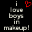 Black background with white pixelated text reading "i love boys in makeup!" and a red heart symbol above the 'i' on the left side.