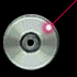 Six circular silver discs with central holes, each showing a red laser dot at different positions across the surface.