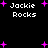 Black background with white pixelated text "Jackie Rocks" and scattered purple plus signs in four quadrants.