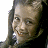 A pixelated contact sheet showing two frames of an animated buddy icon with a woman's face on the left and blue text reading "jersey girl" on the right against a white background.