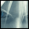 A character with long white hair and blue eyes appears in a sequence of animated frames showing energy effects around the head.