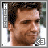 A four- of pixelated images showing a man with short dark hair and stubble, each displaying slightly different facial expressions
