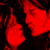 A red-tinted animated sequence showing a person with dark hair in profile, making hand gestures and turning their head.