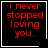 Four identical black square with red pixelated text reading 'i never stopped loving you.' each bordered by white lines, two containing small white symbols in bottom corners