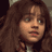Static 48x48 pixel buddy icon showing a close-up of a person with long brown hair and light skin, rendered in low-resolution pixel art style with visible dithering.