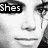 Black-and-white pixelated image of a person's face with text overlays, including 'She's', 'Blonde', and 'and' in top ; bottom shows 'she's' and 'bisexual' in pink