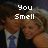 Pixelated image of two people in formal attire with overlaid text reading You Smell Like You