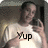 A person in a white shirt takes a mirror selfie with one hand raised, displaying text overlays that change across frames.