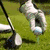 Animated golf-themed sequence showing a hand gripping a club, a golf ball on a tee, and text reading "Let's Go GOLFING!" in pixelated style.