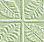 Static pixelated image with four quadrants divided by white lines, featuring abstract green and beige patterns resembling foliage or architectural details.