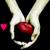Four- shows hands holding a red object, a person with dark hair, a person with light hair, and red text over hands