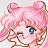 Pixelated close-up of a character with pink hair styled in twin buns, blue eyes, and a smiling expression against a light gray background.