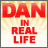 Red text 'DAN IN REAL LIFE' on yellow sunburst background, followed by a person's face and body parts in