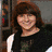Four distinct views of a person with brown hair in different outfits and backgrounds, arranged in a
