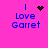 A bright pink background displays blue text reading "I Love Garret" with a black heart symbol above the word "Love" in one frame, and an animated pixelated starburst replacing the heart in subsequent frames.