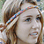 a photo of a person with a colorful headband, text reading "Miley" and "Noah," and a question mark symbol