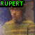 six pixelated images showing a person with light brown hair and striped shirt, each displaying the name 'RUPERT' in green text on black background