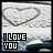 A contact sheet of 18 animated frames showing a heart-shaped snowdrift with "I LOVE YOU" text in blue and white pixelated font over a blurred background.