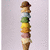A vertical stack of ice cream scoops on a cone with a brown hat, set against a light gray background, accompanied by red pixelated text on a blue background.