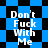 Blue and black checkered background with repeated white text 'Don't Fuck With Me' in pixelated font across four quadrants.